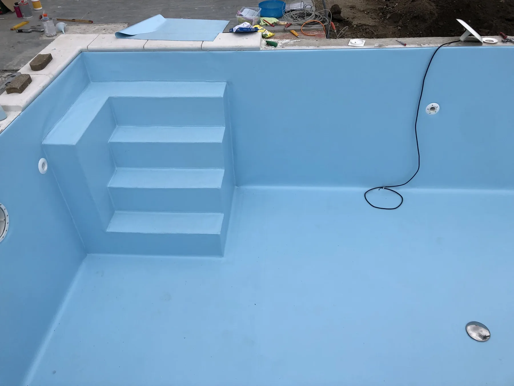Lavoro reale — scala d'ingresso in PVC armato azzurro
